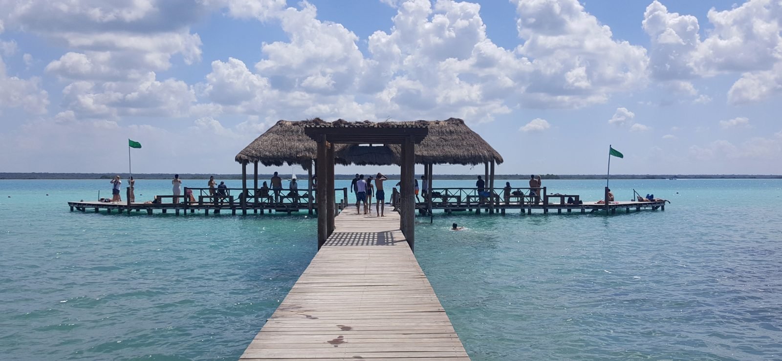 A pier over clear water at Bacalar