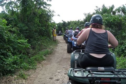 ATVs heading down a jungle trail on Cozumel