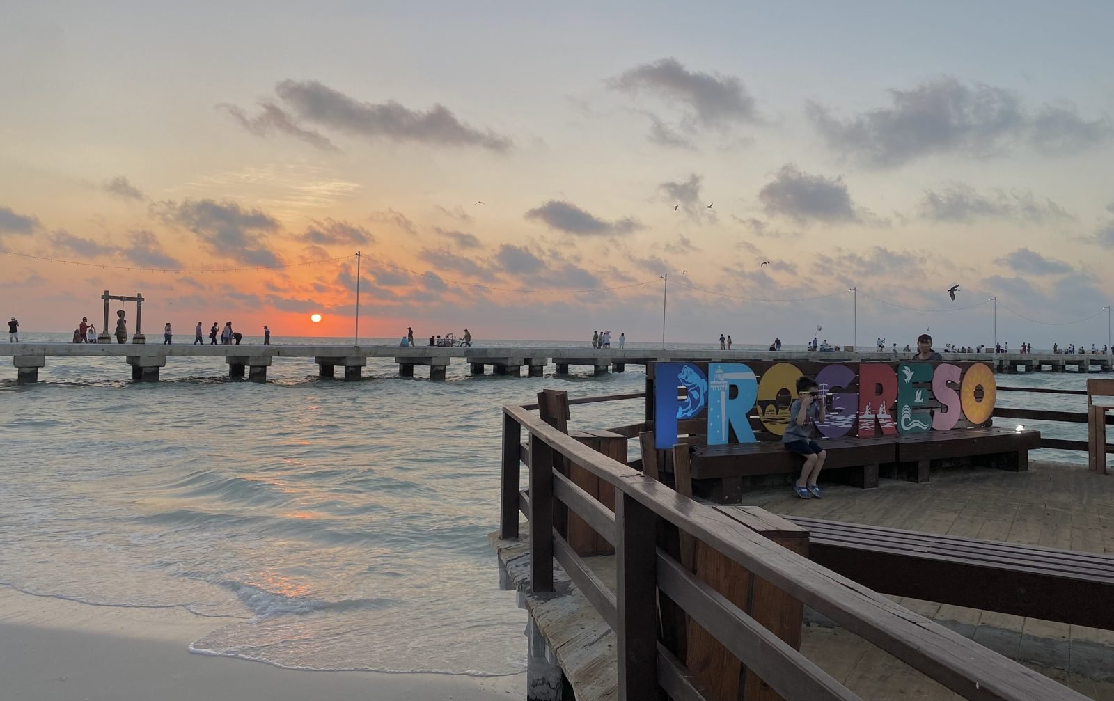 The Progreso sign on the Malecón at sunset