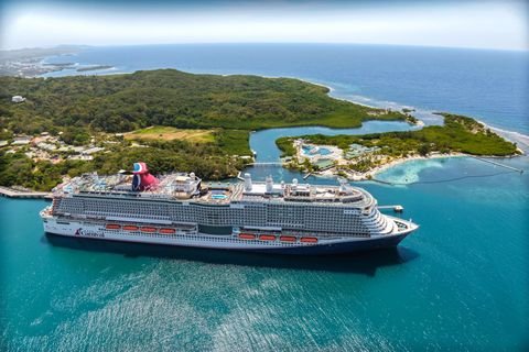 A Carnival ship docked at Isla Tropicale in Dixon Cove