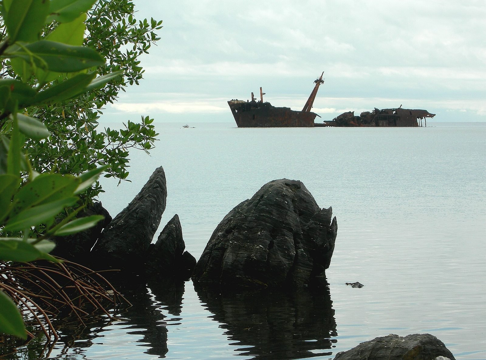 A shipwreck in a bay on Roatan