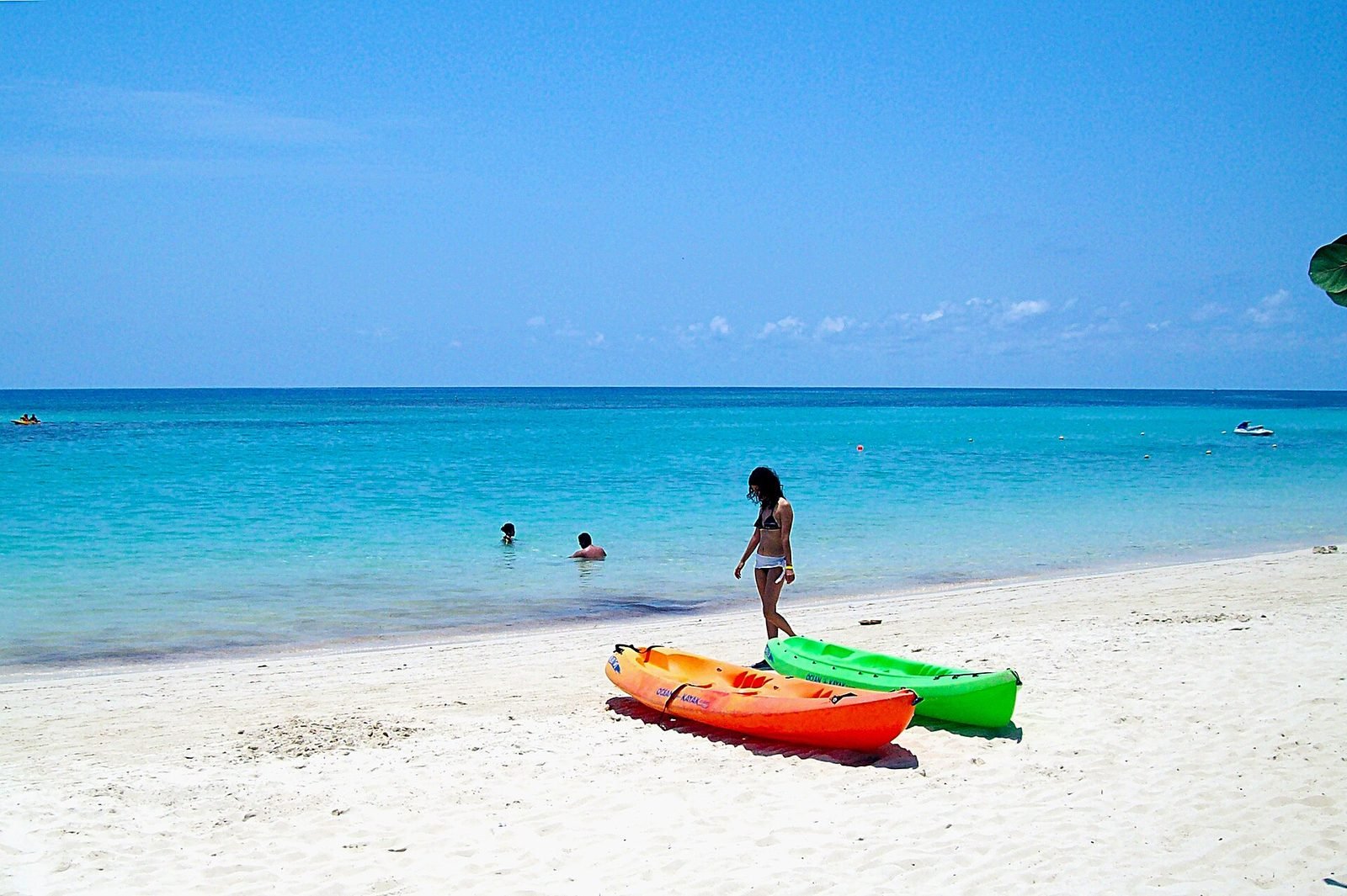Kayaks on the sand at West Bay Beach